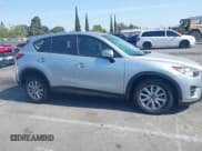 ✅ 2016 Mazda CX-5 Sport • VIN: JM3KE2BY4G0845816 • Lot: 42333248. Listed on IAAI with 48,504 mi. Free auction sales archive from the USA and detailed vehicle history report at DreamBid. Image 13.