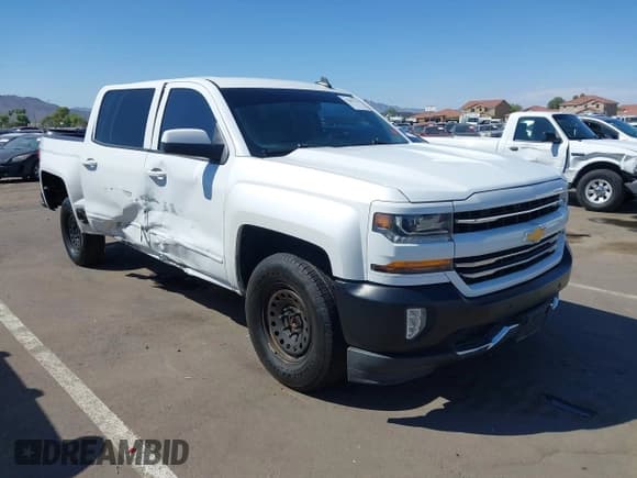 ✅ 2016 Chevrolet Silverado 1500 LT • VIN: 3GCUKREC4GG275783 • Lot: 43207524. Wystawiony na IAAI z przebiegiem 200 808 mil. Bezpłatny archiwum sprzedaży aukcyjnych z USA i szczegółowy raport historii pojazdu na DreamBid. Zdjęcie 1.