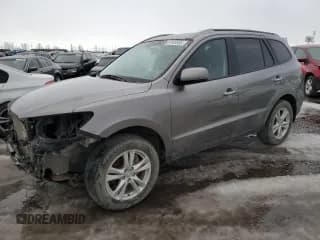 ✅ 2012 Hyundai Santa Fe SE • VIN: 5XYZHDAG8CG122087 • Lot: 87845555. Listed on Copart with Not provided. Free auction sales archive from the USA and detailed vehicle history report at DreamBid. Image 1.