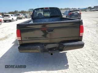 1999 Dodge Dakota SLT z VIN 1B7GL22Y0XS197299, wystawiony jako Copart lot #77276954 z przebiegiem Nie podano mil oraz Nie do naprawy • Non repairable. Historia ofert i sprzedaży dostępna na DreamBid. Obrazek 6.