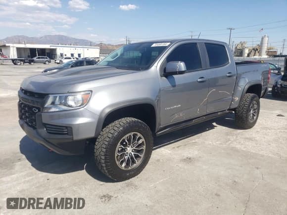 ✅ 2022 Chevrolet Colorado 4WD ZR2 • VIN: 1GCGTEEN4N1310791 • Лот: 70468184. Опубликован ранее на Copart с пробегом 27 006 миль. Бесплатный доступ к архиву аукционных продаж из США и подробный отчёт об истории автомобиля на DreamBid. Изображение 1.
