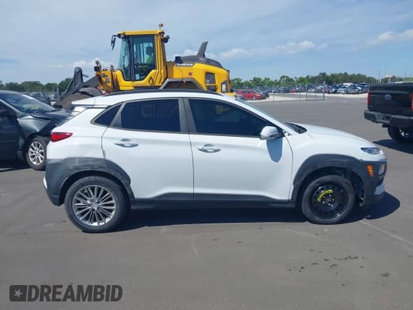 ✅ 2018 Hyundai Kona SEL • VIN: KM8K62AA5JU073459 • Лот: 43352612. Опубликован ранее на IAAI с пробегом 77 655 миль. Бесплатный доступ к архиву аукционных продаж из США и подробный отчёт об истории автомобиля на DreamBid. Изображение 13.