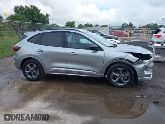 ✅ 2023 Ford Escape ST-Line • VIN: 1FMCU0MN1PUA43977 • Lot: 43192763. Listed on IAAI with 75,350 mi. Free auction sales archive from the USA and detailed vehicle history report at DreamBid. Image 13.