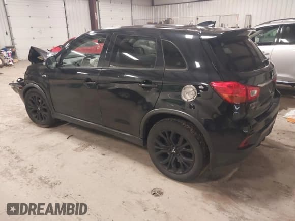 ✅ 2018 Mitsubishi Outlander ES • VIN: JA4AR3AUXJZ022317 • Lot: 43801759. Listed on IAAI with 94,704 mi. Free auction sales archive from the USA and detailed vehicle history report at DreamBid. Image 3.