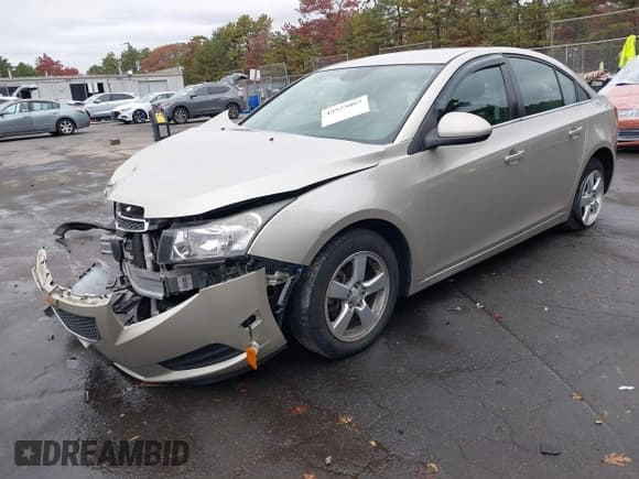 ✅ 2013 Chevrolet Cruze 1LT • VIN: 1G1PC5SBXD7147918 • Lot: 43573003. Listed on IAAI with 79,414 mi. Free auction sales archive from the USA and detailed vehicle history report at DreamBid. Image 2.