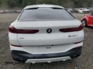 ✅ 2022 BMW X6 M50i • VIN: 5UXCY8C08N9J38662 • Лот: 80366015. Опубликован ранее на Copart с пробегом Не указан. Бесплатный доступ к архиву аукционных продаж из США и подробный отчёт об истории автомобиля на DreamBid. Изображение 6.