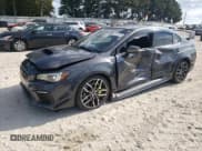 ✅ 2020 Subaru WRX STI • VIN: JF1VA2E6XL9818692 • Lot: 84190615. Listed on Copart with 60,345 mi. Free auction sales archive from the USA and detailed vehicle history report at DreamBid. Image 1.