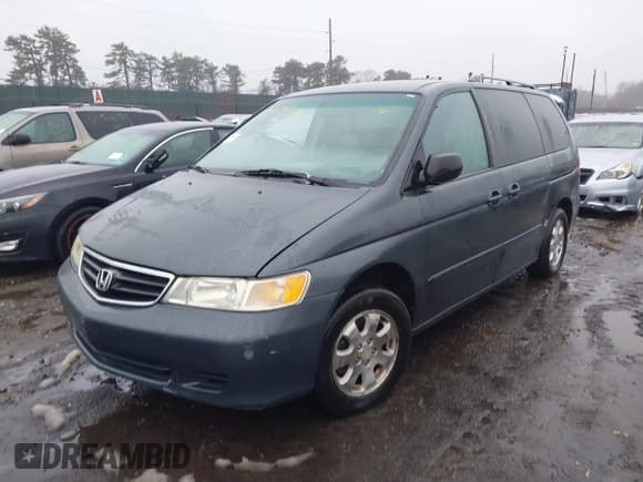✅ 2004 Honda Odyssey EX-L • VIN: 5FNRL18784B074778 • Lot: 41604779. Listed on IAAI with Not provided. Free auction sales archive from the USA and detailed vehicle history report at DreamBid. Image 2.