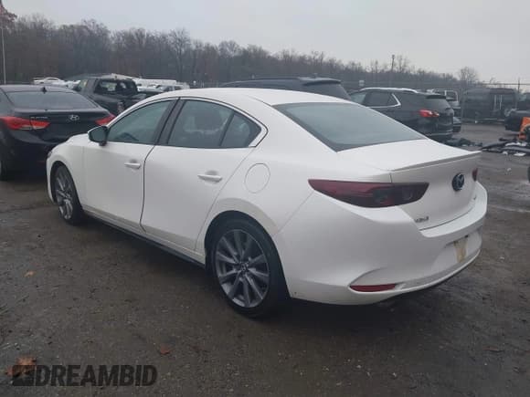 ✅ 2021 Mazda 3 Select • VIN: JM1BPABL4M1319578 • Лот: 43771777. Опубликован ранее на IAAI с пробегом 83 317 миль. Бесплатный доступ к архиву аукционных продаж из США и подробный отчёт об истории автомобиля на DreamBid. Изображение 3.
