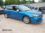 ✅ 2017 Subaru Impreza Premium • VIN: 4S3GTAD63H3742445 • Lot: 43034929. Listed on IAAI with 127,296 mi. Free auction sales archive from the USA and detailed vehicle history report at DreamBid. Image 1.