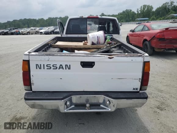 ✅ 1996 Nissan Frontier XE • VIN: 1N6SD16S6TC389626 • Lot: 59312595. Listed on Copart with 210,292 mi. Free auction sales archive from the USA and detailed vehicle history report at DreamBid. Image 6.