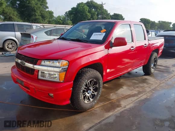 2012 Chevrolet Colorado 1LT z VIN 1GCDSCFE0C8106115, wystawiony jako IAAI lot #42049885 z przebiegiem 229 075 mil mil oraz . Historia ofert i sprzedaży dostępna na DreamBid. Obrazek 21.