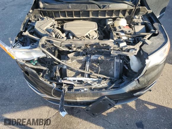 ✅ 2018 GMC Acadia Denali • VIN: 1GKKNXLS9JZ159407 • Lot: 90319705. Listed on Copart with 107,469 mi. Free auction sales archive from the USA and detailed vehicle history report at DreamBid. Image 12.