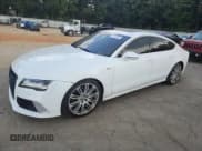 ✅ 2013 Audi A7 Prestige • VIN: WAU2GAFC5DN010492 • Lot: 71712325. Listed on Copart with 175,012 mi. Free auction sales archive from the USA and detailed vehicle history report at DreamBid. Image 1.