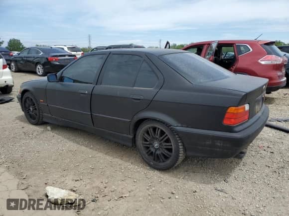 1998 BMW 3 Series 328i with VIN WBACD4329WAV60069, listed as a Copart auction lot 57724115 with 113,414 mi miles and Clean title. Bid and sale history available at DreamBid. Image 2.