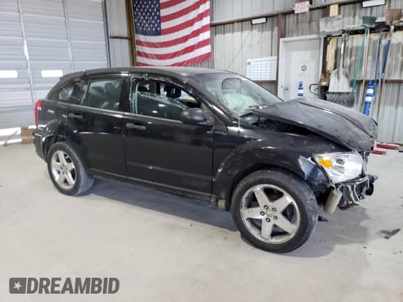 ✅ 2008 Dodge Caliber SE • VIN: 1B3HB28BX8D738697 • Lot: 85587395. Listed on Copart with 218,628 mi. Free auction sales archive from the USA and detailed vehicle history report at DreamBid. Image 4.