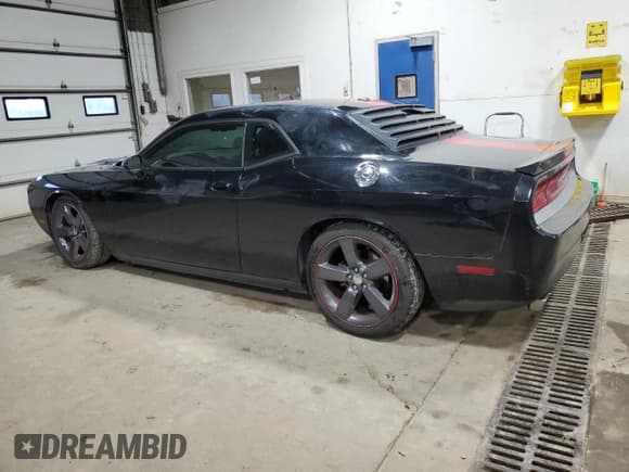 ✅ 2012 Dodge Challenger SXT Plus • VIN: 2C3CDYAG2CH285767 • Лот: 86843035. Опубликован ранее на Copart с пробегом 152 182 миль. Бесплатный доступ к архиву аукционных продаж из США и подробный отчёт об истории автомобиля на DreamBid. Изображение 2.