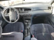 ✅ 1996 Mercury Mystique • VIN: 1MELM6532TK639432 • Лот: 41884055. Опубликован ранее на Copart с пробегом 134 991 миль. Бесплатный доступ к архиву аукционных продаж из США и подробный отчёт об истории автомобиля на DreamBid. Изображение 8.