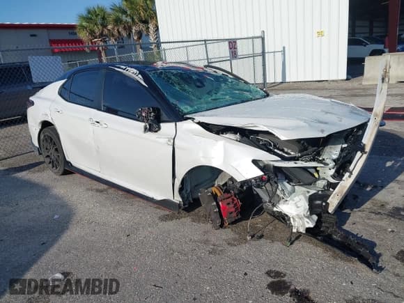 ✅ 2022 Toyota Camry TRD • VIN: 4T1KZ1AK3NU068132 • Lot: 41997486. Listed on IAAI with 23,437 mi. Free auction sales archive from the USA and detailed vehicle history report at DreamBid. Image 1.