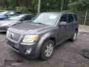 2010 Mercury Mariner z VIN 4M2CN9BG3AKJ08951, wystawiony jako IAAI lot #43002446 z przebiegiem 182 349 mil mil oraz . Historia ofert i sprzedaży dostępna na DreamBid. Obrazek 2.