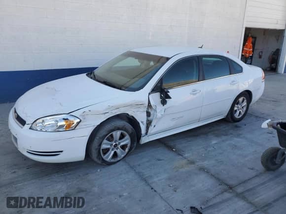 2013 Chevrolet Impala LS with VIN 2G1WF5E37D1184588, listed as a Copart auction lot 82370615 with 220,421 mi miles and Salvage title. Bid and sale history available at DreamBid. Image 1.