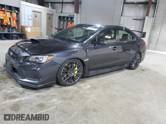 ✅ 2018 Subaru WRX STI • VIN: JF1VA2N60J9827947 • Lot: 91576435. Listed on Copart with 125,554 mi. Free auction sales archive from the USA and detailed vehicle history report at DreamBid. Image 1.