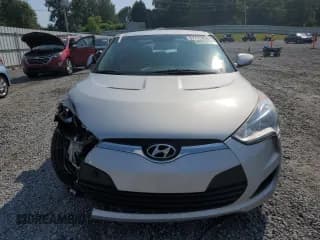 ✅ 2014 Hyundai Veloster • VIN: KMHTC6AD1EU183378 • Lot: 67775904. Listed on Copart with 121,477 mi. Free auction sales archive from the USA and detailed vehicle history report at DreamBid. Image 5.