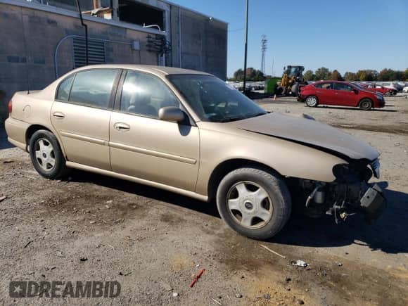 2001 Chevrolet Malibu LS with VIN 1G1NE52J516247046, listed as a Copart auction lot 77323744 with 196,580 mi miles and Salvage title. Bid and sale history available at DreamBid. Image 4.