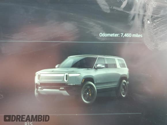 ✅ 2022 Rivian R1S Launch Edition • VIN: 7PDSGABLXNN000317 • Lot: 81008293. Listed on Copart with 7,460 mi. Free auction sales archive from the USA and detailed vehicle history report at DreamBid. Image 9.