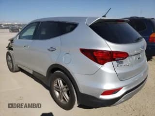 ✅ 2018 Hyundai Santa Fe 2.4L • VIN: 5XYZT3LB2JG572664 • Лот: 38886843. Опубликован ранее на Copart с пробегом 63 579 миль. Бесплатный доступ к архиву аукционных продаж из США и подробный отчёт об истории автомобиля на DreamBid. Изображение 2.