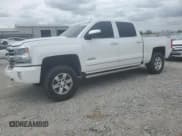 ✅ 2018 Chevrolet Silverado 1500 High Country • VIN: 3GCUKTEC1JG171093 • Lot: 54329275. Listed on Copart with 211,333 mi. Free auction sales archive from the USA and detailed vehicle history report at DreamBid. Image 1.
