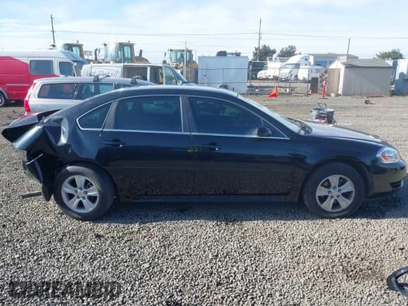 ✅ 2014 Chevrolet Impala LS • VIN: 2G1WA5E33E1140331 • Lot: 43507195. Listed on IAAI with 102,299 mi. Free auction sales archive from the USA and detailed vehicle history report at DreamBid. Image 13.