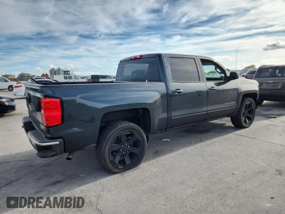 ✅ 2018 Chevrolet Silverado 1500 LT • VIN: 3GCPCREC4JG103383 • Lot: 93259325. Wystawiony na Copart z przebiegiem 182 821 mil. Bezpłatny archiwum sprzedaży aukcyjnych z USA i szczegółowy raport historii pojazdu na DreamBid. Zdjęcie 3.