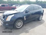 ✅ 2014 Cadillac SRX Premium Collection • VIN: 3GYFNDE35ES687279 • Lot: 43050022. Listed on IAAI with 122,496 mi. Free auction sales archive from the USA and detailed vehicle history report at DreamBid. Image 2.