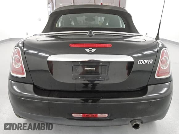 ✅ 2013 MINI Roadster • VIN: WMWSY1C50DT429218 • Lot: 53972555. Listed on Copart with 196,233 mi. Free auction sales archive from the USA and detailed vehicle history report at DreamBid. Image 6.