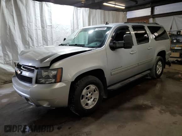 2013 Chevrolet Suburban LS с VIN 1GNSKHE72DR266801, выставлен на аукционе Copart как лот 71655405 с пробегом 214 077 миль миль и Списание • Salvage title. История ставок и продаж доступна на DreamBid. Изображение 1.