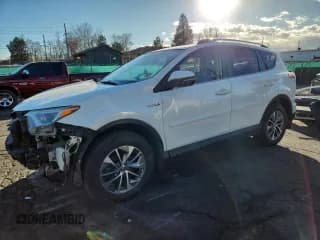 ✅ 2018 Toyota RAV4 Hybrid XLE • VIN: JTMRJREV6JD245828 • Лот: 93509145. Опубликован ранее на Copart с пробегом 114 020 миль. Бесплатный доступ к архиву аукционных продаж из США и подробный отчёт об истории автомобиля на DreamBid. Изображение 1.