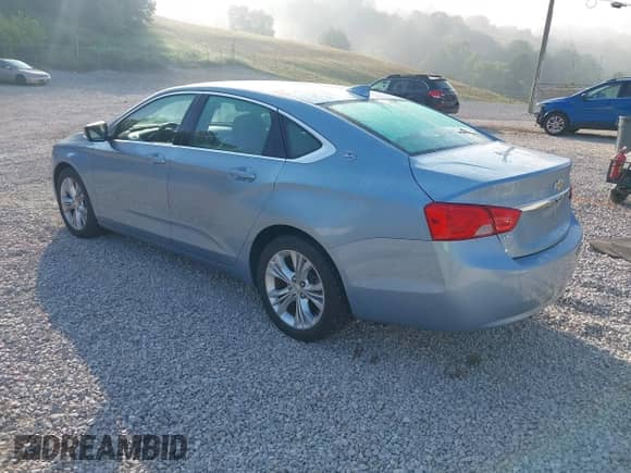 2015 Chevrolet Impala LT with VIN 1G1125S36FU100682, listed as a IAAI auction lot 43003210 with 76,563 mi miles and . Bid and sale history available at DreamBid. Image 3.