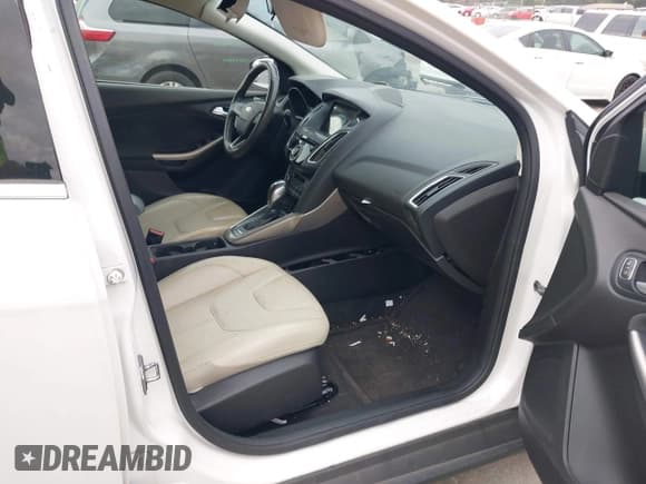 ✅ 2016 Ford Focus Titanium • VIN: 1FADP3N26GL222971 • Лот: 43505893. Опубликован ранее на IAAI с пробегом 117 042 миль. Бесплатный доступ к архиву аукционных продаж из США и подробный отчёт об истории автомобиля на DreamBid. Изображение 5.