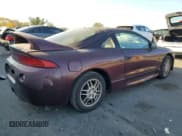 ✅ 1999 Mitsubishi Eclipse GS • VIN: 4A3AK44Y1XE074155 • Лот: 77143944. Опубликован ранее на Copart с пробегом 105 262 миль. Бесплатный доступ к архиву аукционных продаж из США и подробный отчёт об истории автомобиля на DreamBid. Изображение 3.