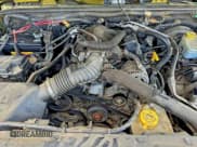 ✅ 2008 Jeep Wrangler Unlimited Sahara • VIN: 1J4GA59148L521893 • Lot: 94819545. Wystawiony na Copart z przebiegiem 149 749 mil. Bezpłatny archiwum sprzedaży aukcyjnych z USA i szczegółowy raport historii pojazdu na DreamBid. Zdjęcie 7.