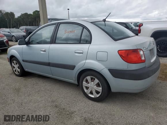 ✅ 2007 Kia Rio LX • VIN: KNADE123376211942 • Lot: 75014014. Listed on Copart with 116,651 mi. Free auction sales archive from the USA and detailed vehicle history report at DreamBid. Image 2.