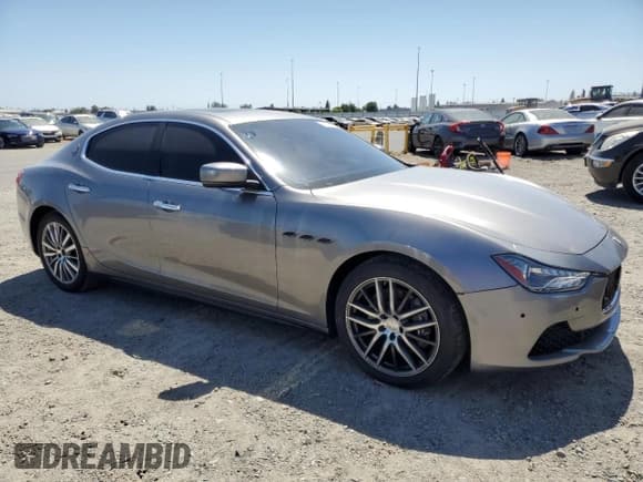 ✅ 2015 Maserati Ghibli S Q4 • VIN: ZAM57RTA1F1144116 • Lot: 60228315. Listed on Copart with 46,037 mi. Free auction sales archive from the USA and detailed vehicle history report at DreamBid. Image 4.
