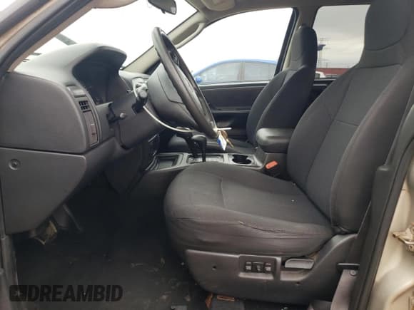 ✅ 2003 Jeep Grand Cherokee Laredo • VIN: 1J4GW48S83C600188 • Lot: 86791215. Listed on Copart with 171,990 mi. Free auction sales archive from the USA and detailed vehicle history report at DreamBid. Image 7.