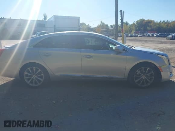 ✅ 2013 Cadillac XTS Luxury • VIN: 2G61P5S3XD9220569 • Lot: 43407862. Listed on IAAI with 121,728 mi. Free auction sales archive from the USA and detailed vehicle history report at DreamBid. Image 13.