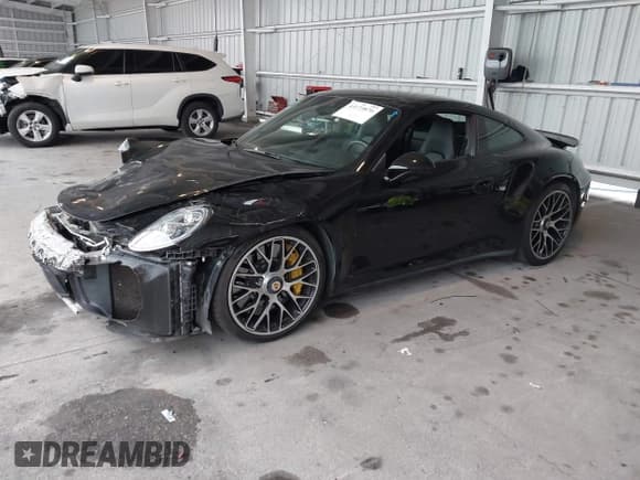 ✅ 2014 Porsche 911 Turbo • VIN: WP0AD2A90ES167293 • Lot: 43173870. Listed on IAAI with 25,383 mi. Free auction sales archive from the USA and detailed vehicle history report at DreamBid. Image 2.
