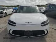 ✅ 2024 Genesis GV60 Advanced • VIN: KMUKCDSC0RU023280 • Lot: 76658184. Wystawiony na Copart z przebiegiem 1 018 mil. Bezpłatny archiwum sprzedaży aukcyjnych z USA i szczegółowy raport historii pojazdu na DreamBid. Zdjęcie 5.