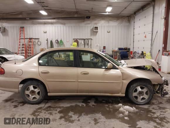 2003 Chevrolet Malibu LS z VIN 1G1NE52J03M680630, wystawiony jako IAAI lot #41585900 z przebiegiem 103 675 mil mil oraz . Historia ofert i sprzedaży dostępna na DreamBid. Obrazek 13.