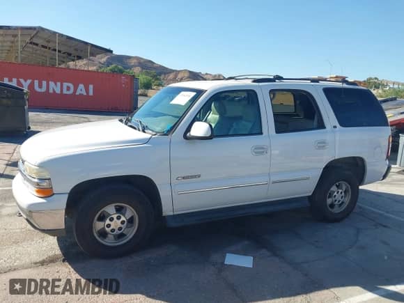 2001 Chevrolet Tahoe LT z VIN 1GNEK13T01R227432, wystawiony jako IAAI lot #43384510 z przebiegiem 171 563 mil mil oraz . Historia ofert i sprzedaży dostępna na DreamBid. Obrazek 14.