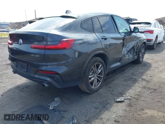 ✅ 2021 BMW X4 xDrive30i • VIN: 5UX2V1C02M9G88260 • Lot: 41991270. Listed on IAAI with 48,817 mi. Free auction sales archive from the USA and detailed vehicle history report at DreamBid. Image 4.